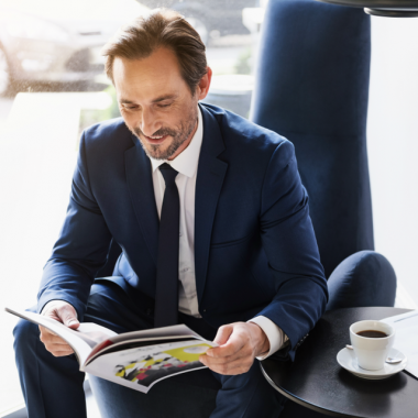 Man Reading Brochure